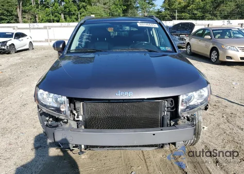 2016 Jeep Compass Latitude z USA, uszkodzony, nr VIN 1C4NJCEB1GD603086